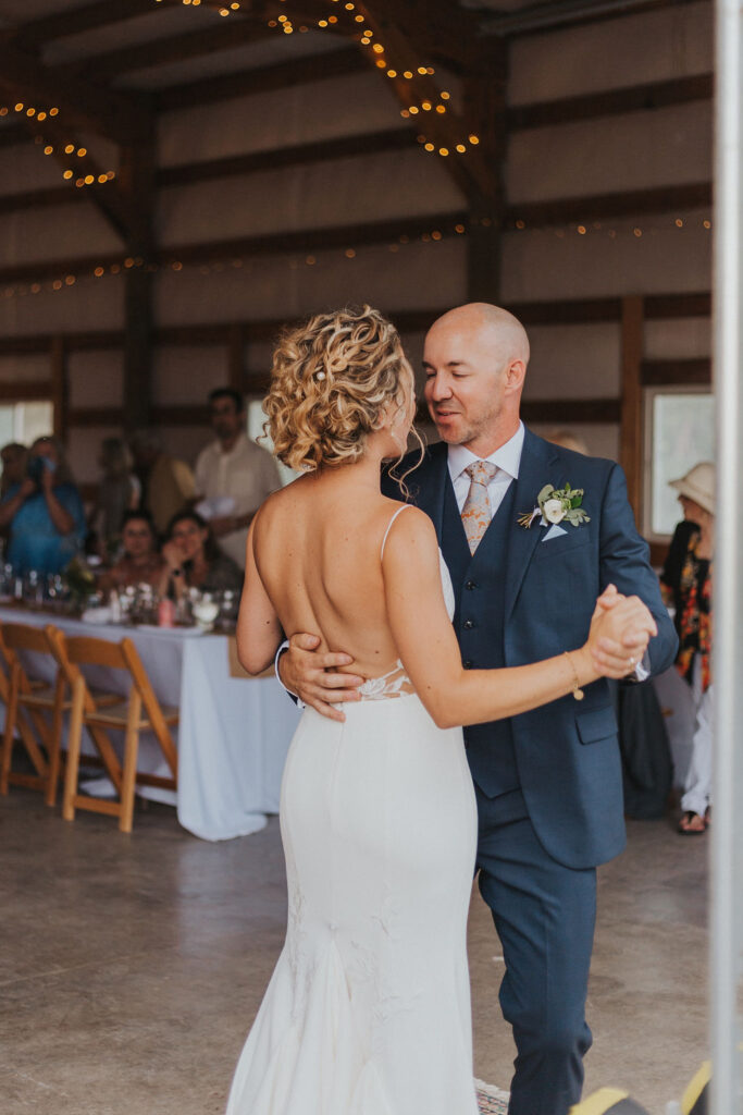 Bride and groom dancing during wedding