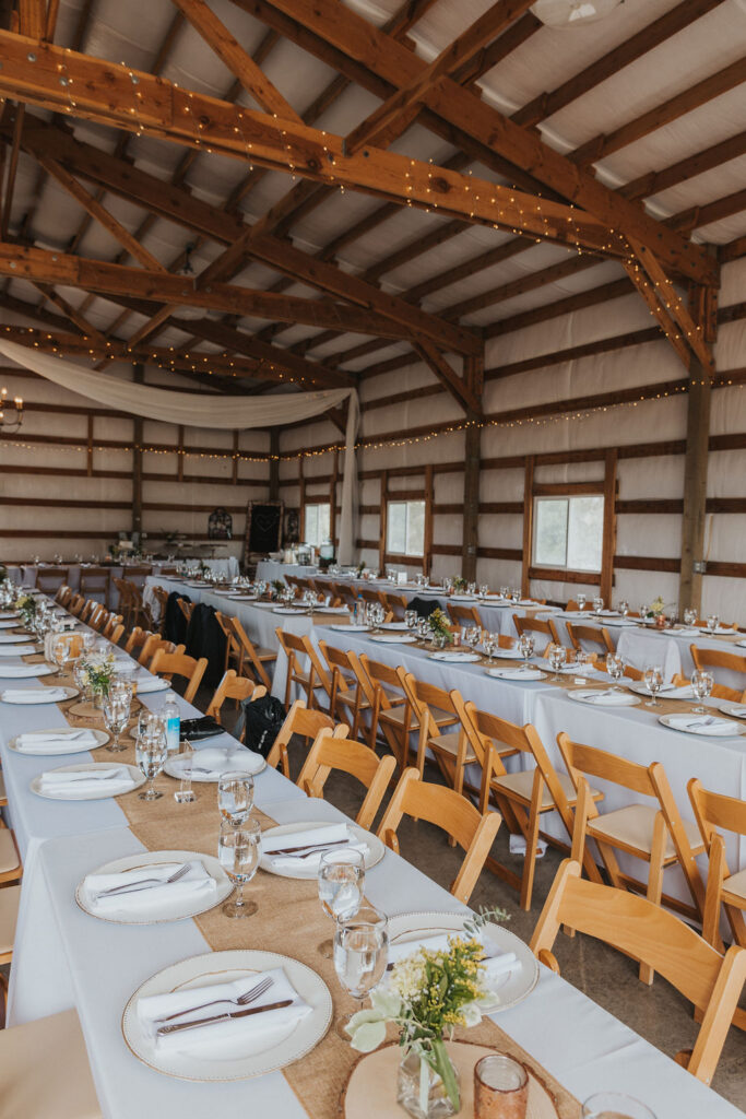 Summer wedding reception in barn