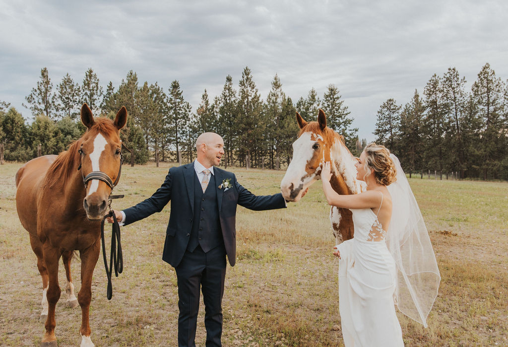 Bride and groom portraits with horses captured by Spokane wedding photographer Kat Nielsen Photography