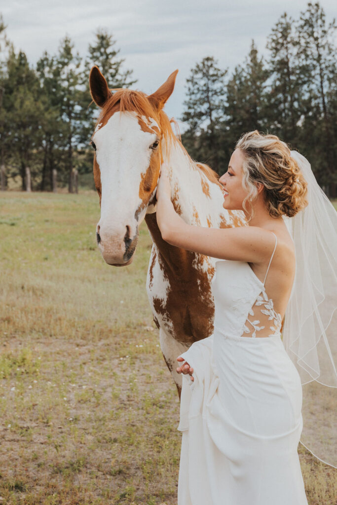 Bridal portrait with horse captured by Spokane wedding photographer Kat Nielsen Photography