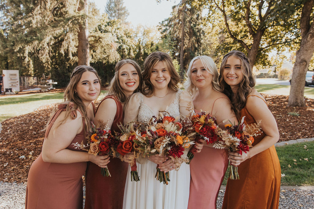 Bride and bridesmaids photos from fall boho wedding in Couer d'Alene Idaho wedding
