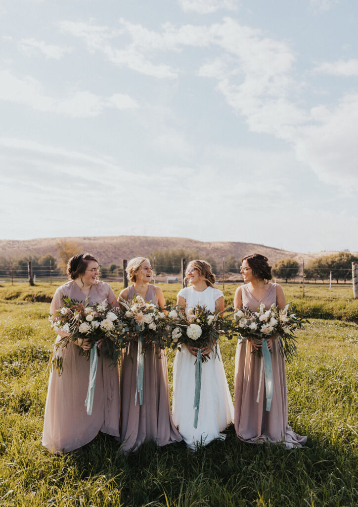 Bride and bridesmaids photos from rustic outdoor wedding in Washington captured by Kat Nielsen - Washington wedding photographer