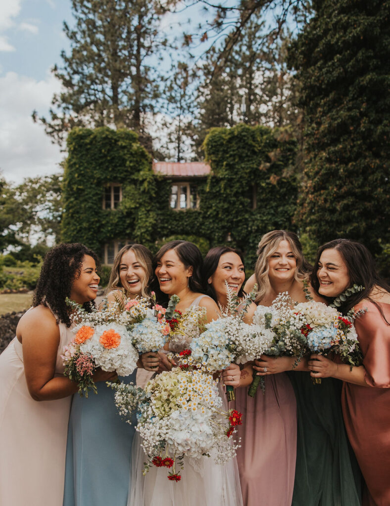 Bride and bridesmaids, mismatched bridesmaids dresses