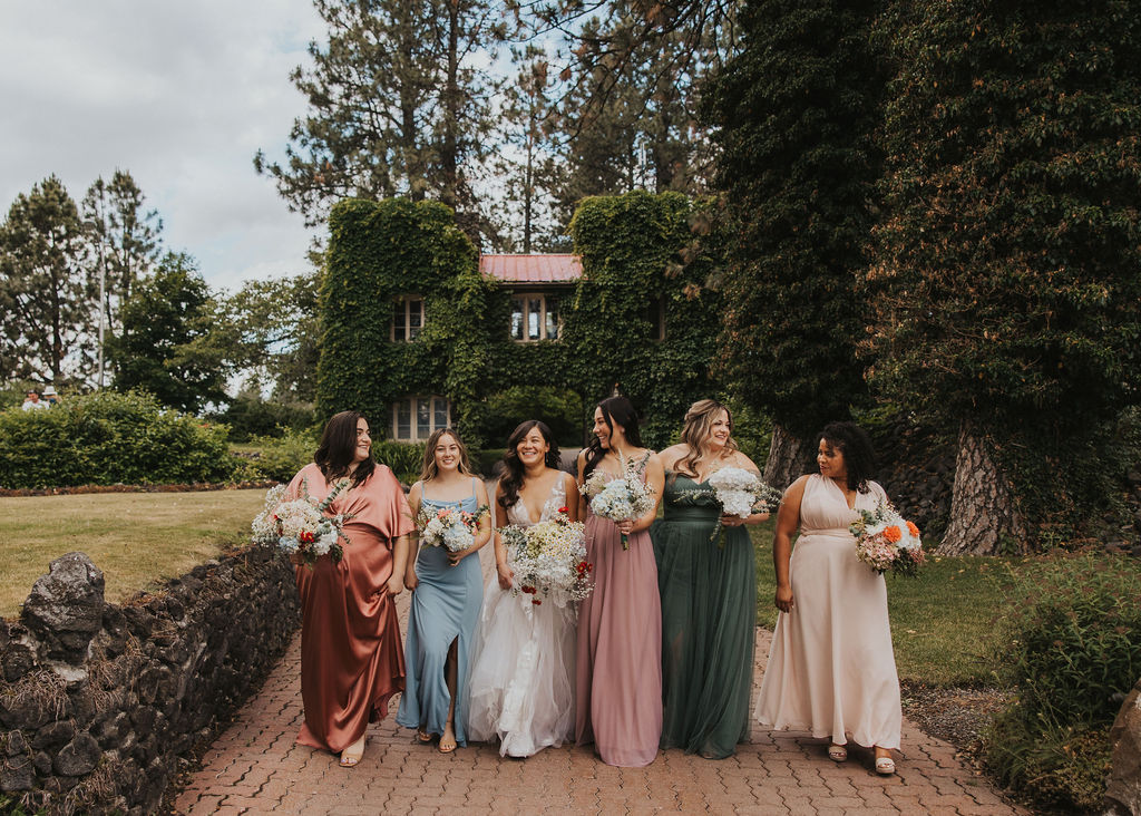Bride and bridesmaids, mismatched bridesmaids dresses