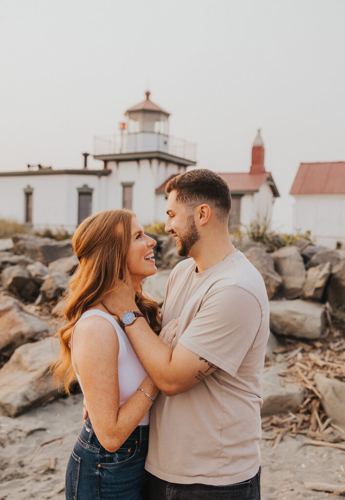 Romantic engagement photos at Discovery Park in Seattle