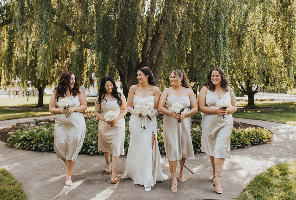 bride and bridesmaids photo, bridesmaids wearing neutral bridesmaid dresses