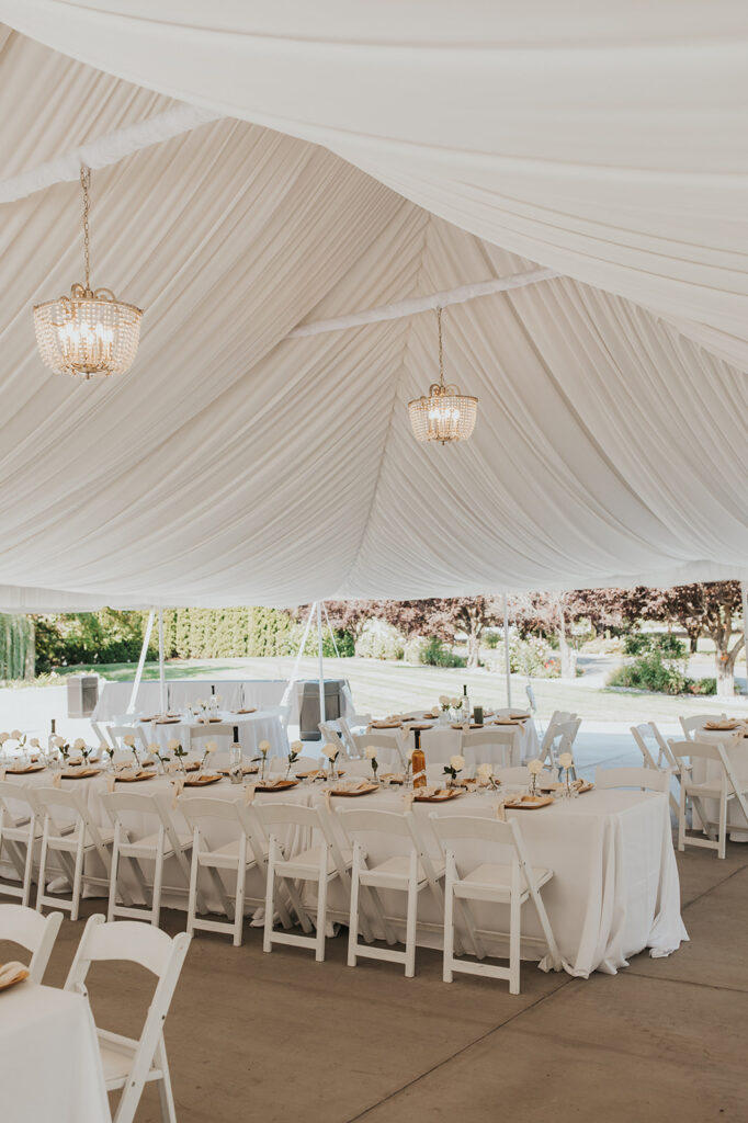 all white promise garden venue set up and decor
