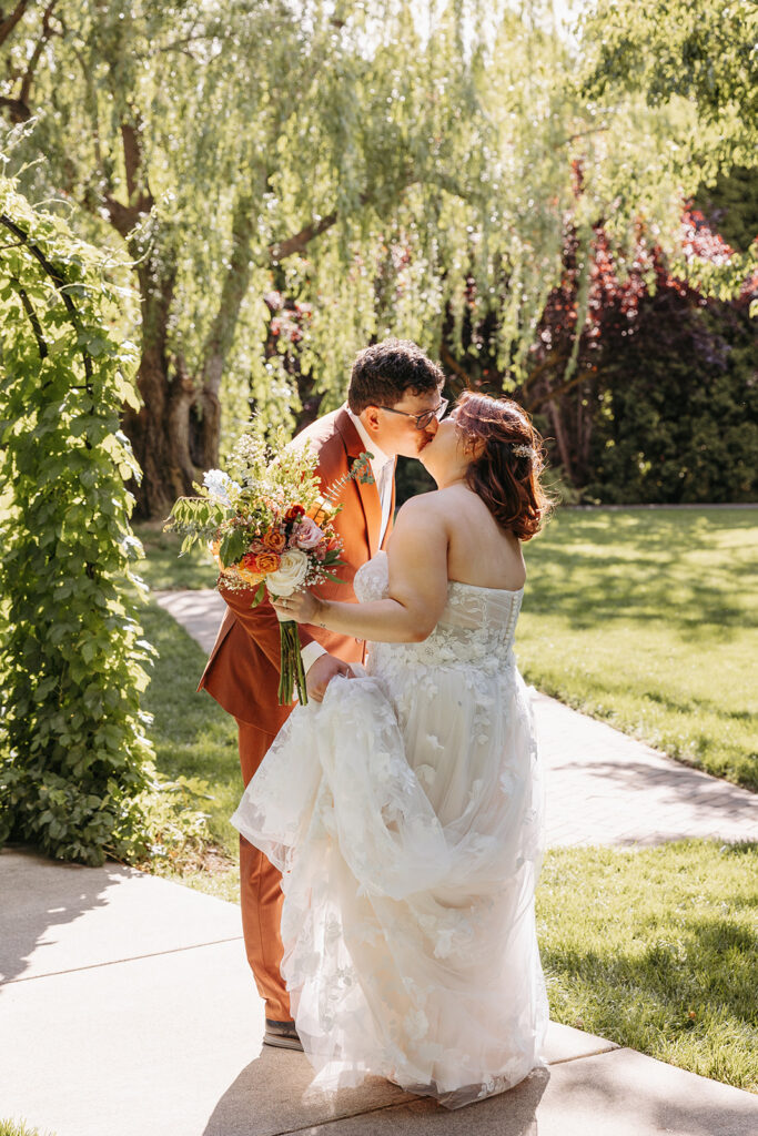 Bride and groom portraits at Promise Garden