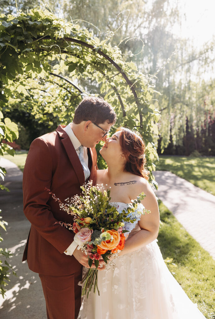 Bride and groom portraits at Promise Garden