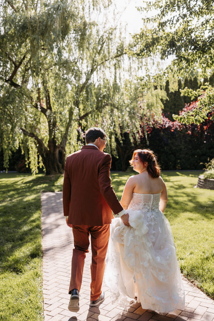 Bride and groom portraits at Promise Garden