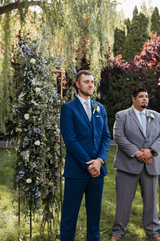 Austin's tearful expression as he sees Samantha walking down the aisle