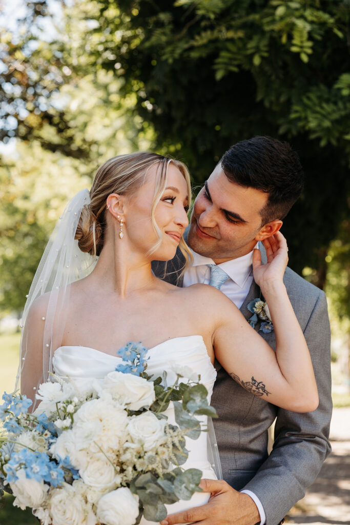 Terra Blanca Winery’s sun-soaked vineyards provide a stunning backdrop for a summer wedding portrait.