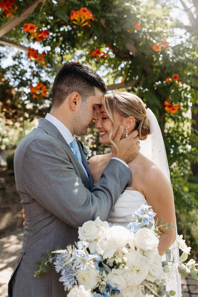 Terra Blanca Winery’s sun-soaked vineyards provide a stunning backdrop for a summer wedding portrait.