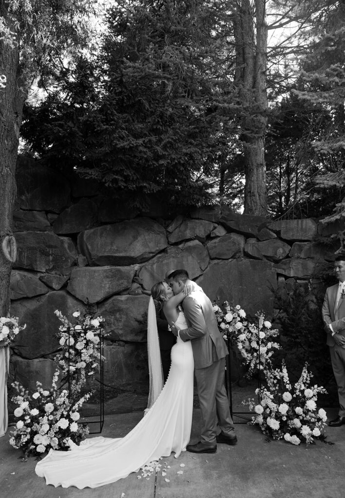 Romantic wedding ceremony at Terra Blanca Winery, surrounded by elegant blue and white florals.