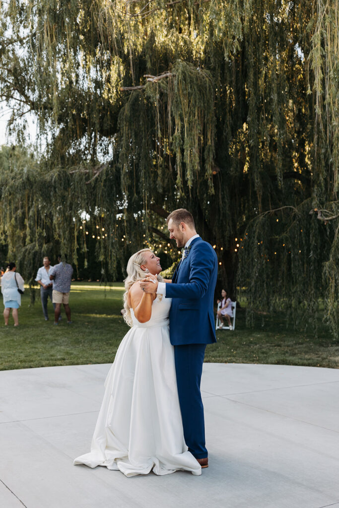 Samantha and Austin's first dance under twinkling lights during the reception.