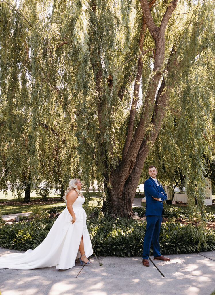 Samantha and Austin sharing a tender moment during their first look in the Promise Garden.
