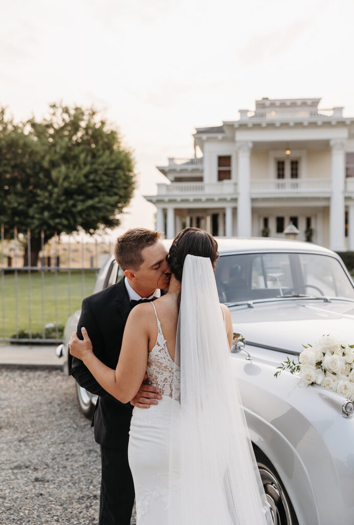 Timeless bride and groom photos at The Moore Mansion with a classic car