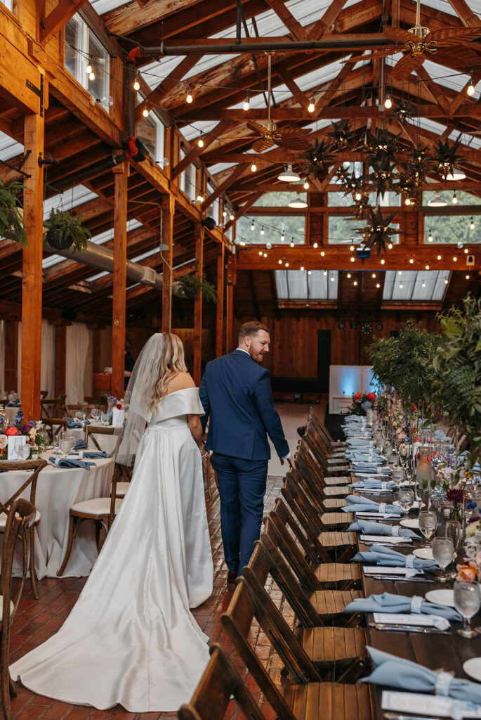 Stunning greenhouse-style wedding table set ups in Kiana Lodge