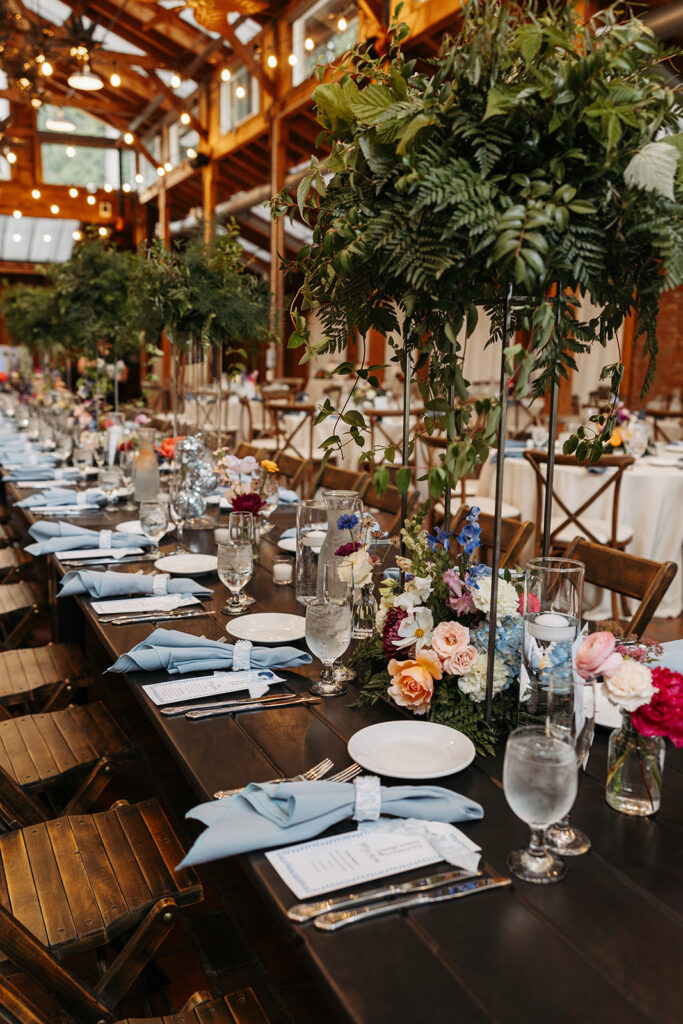 Stunning greenhouse-style wedding table settings in Kiana Lodge