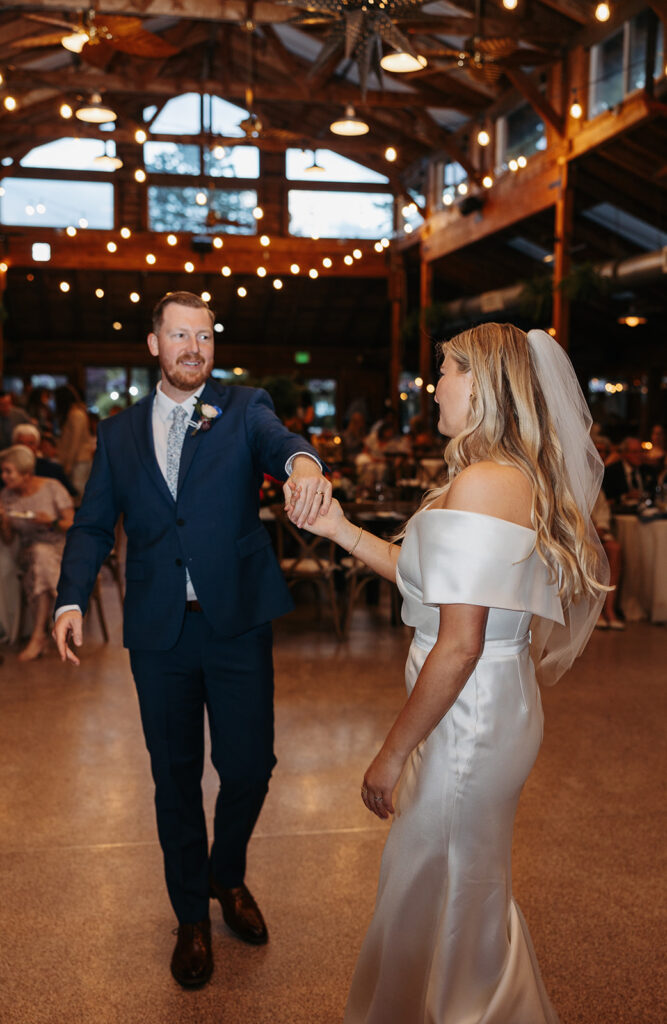 Bride and groom, first dance in Kiana Lodge