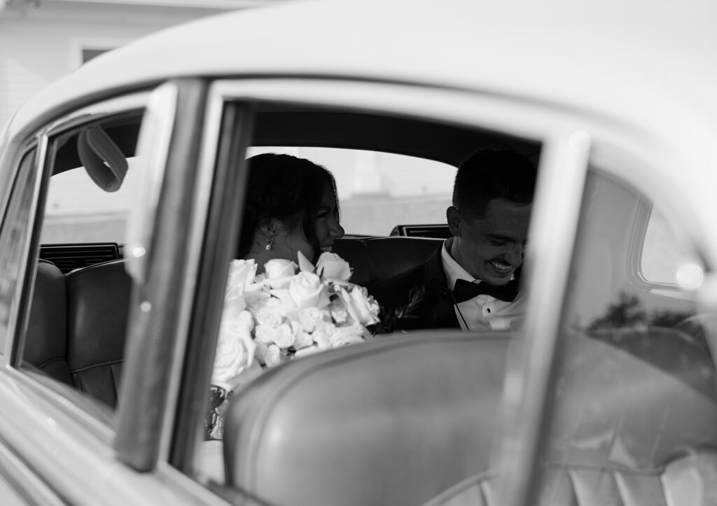 Timeless bride and groom photos at The Moore Mansion with a classic car