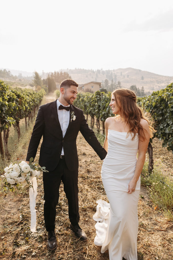 Bride and groom portraits in the vineyards at Karma Vineyards in Chelan, WA