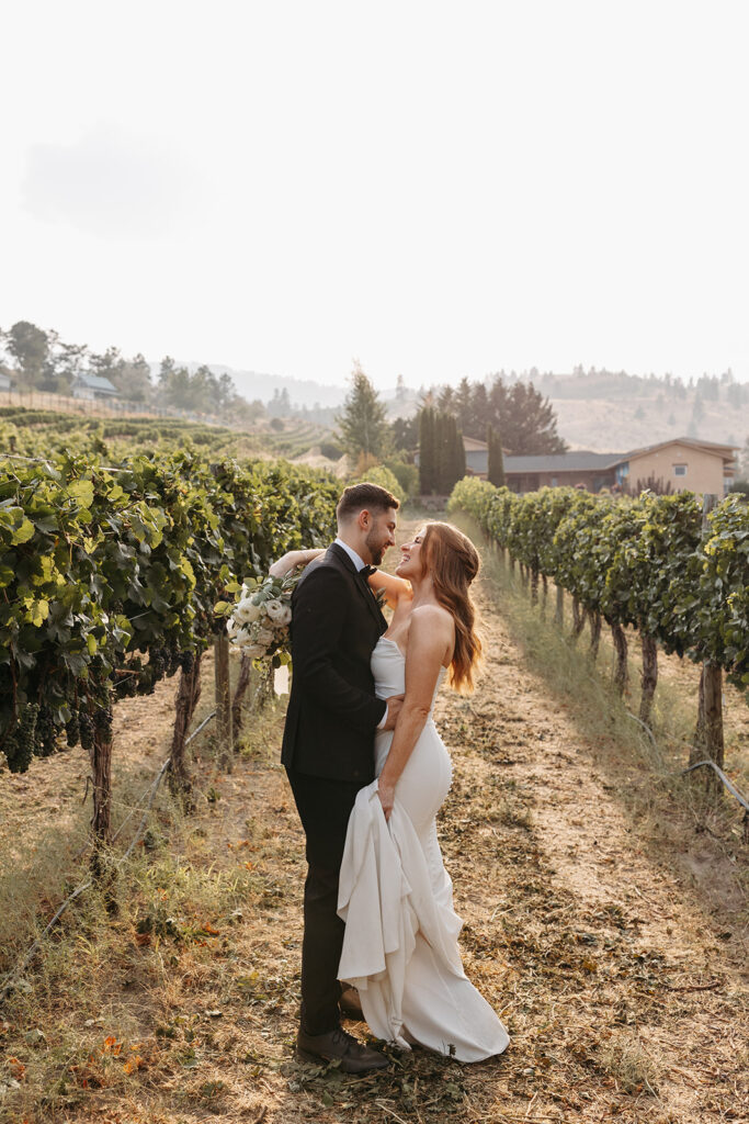 Bride and groom portraits in the vineyards at Karma Vineyards in Chelan, WA