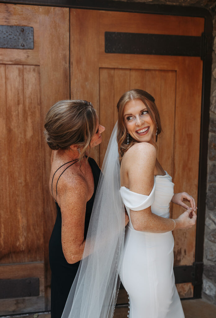 Bride gets ready for her wedding day at Karma Vineyards in Chelan, WA