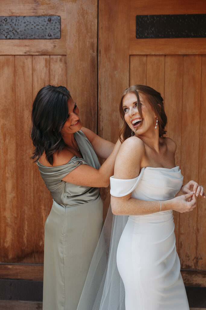 Bride gets ready for her wedding day at Karma Vineyards in Chelan, WA