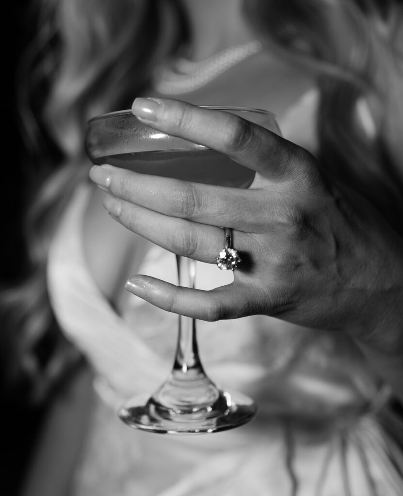 Classy bar engagement photos with cocktails