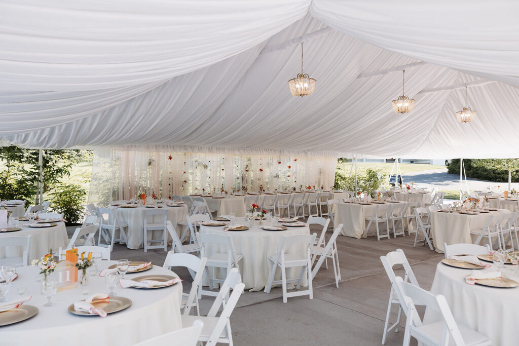 Reception setup under the tent at Promise Garden in Pasco, WA