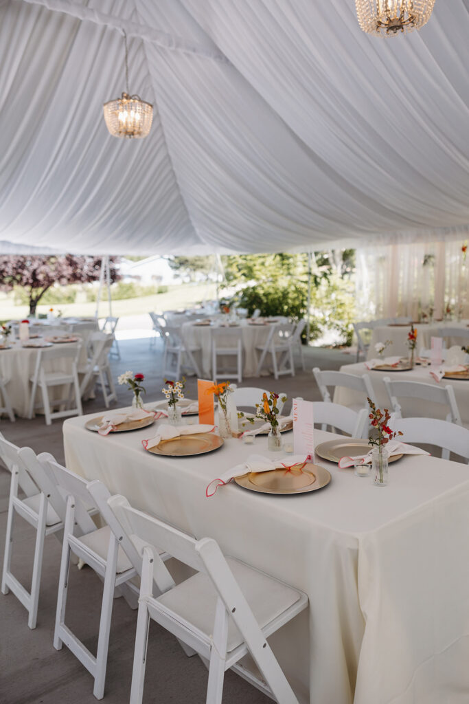 Reception setup under the tent at Promise Garden in Pasco, WA