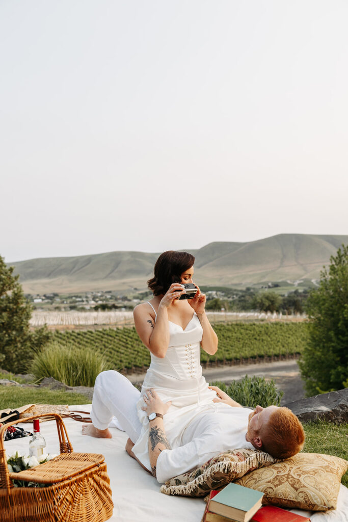 Picnic engagement photos at sunset at Terra Blanca Winery