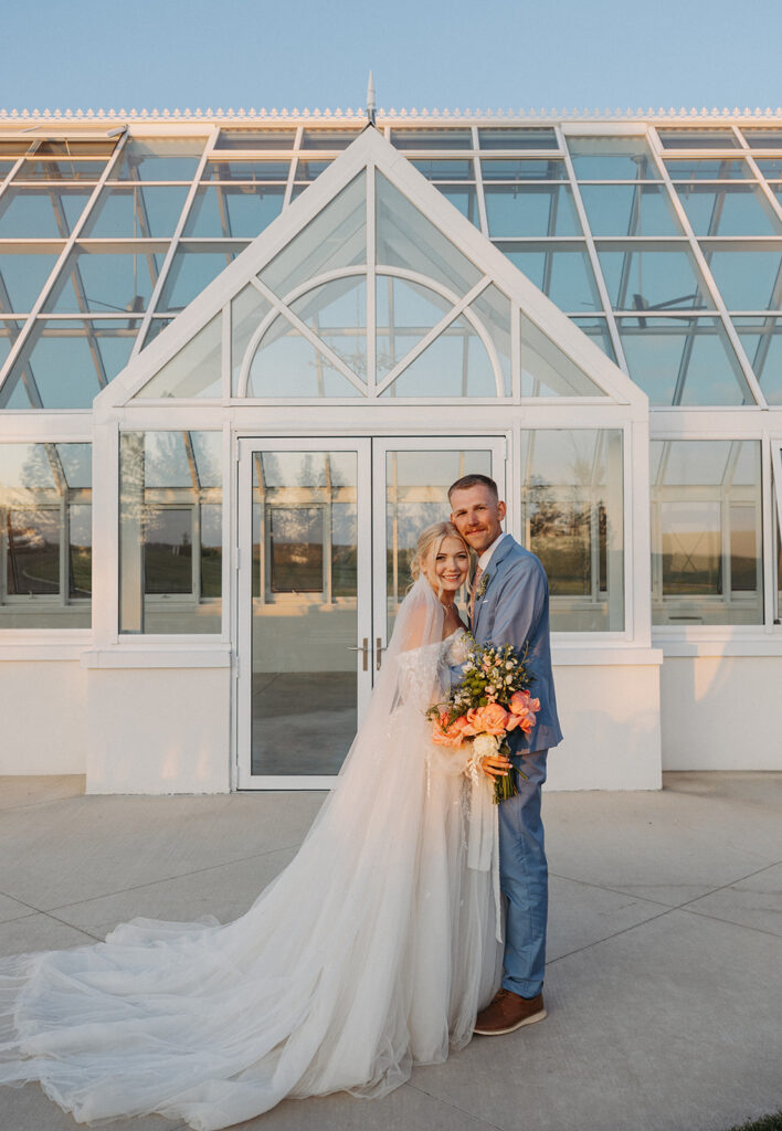 Spokane wedding portraits in front of The Greenhouse on Harvard