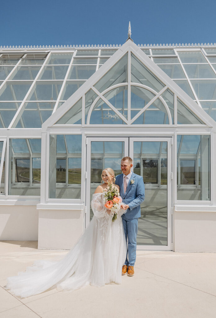 Spokane wedding portraits in front of The Greenhouse on Harvard