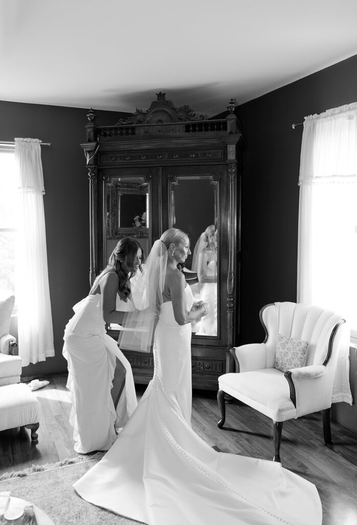Bride gets ready in the bridal suite of the Moore Mansion