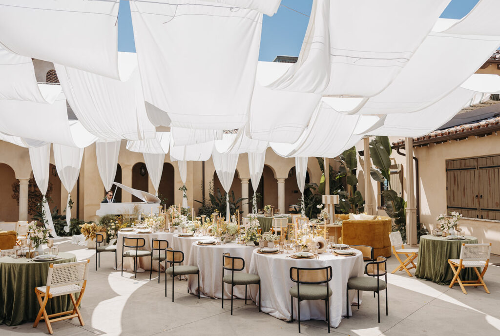 Luxury wedding in Scottsdale, Arizona with lots of draping and clean decor