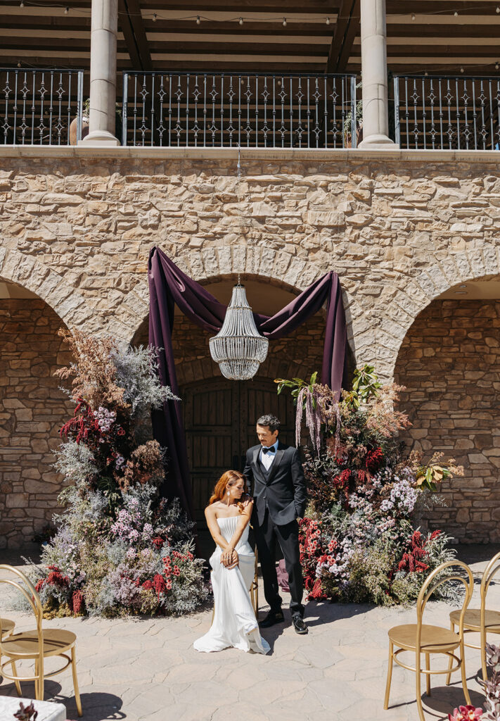 Bride and groom in their wedding ceremony space at Vienza Terrace at Europa Village