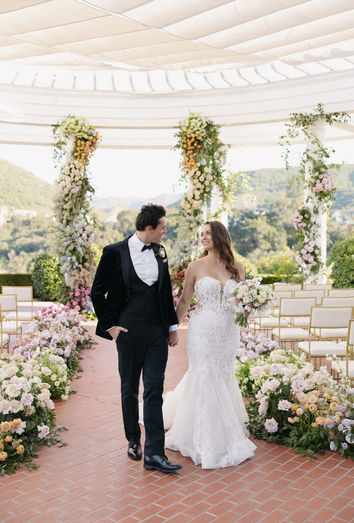 Bride and groom photos on East Terrace at Sherwood Country Club