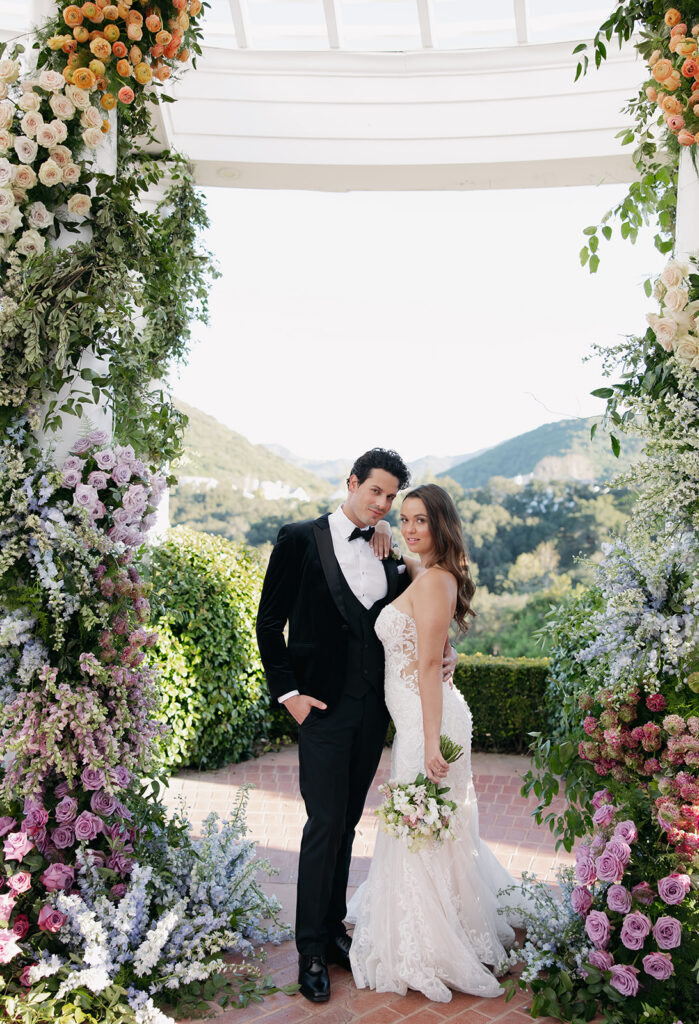 Bride and groom photos on East Terrace at Sherwood Country Club