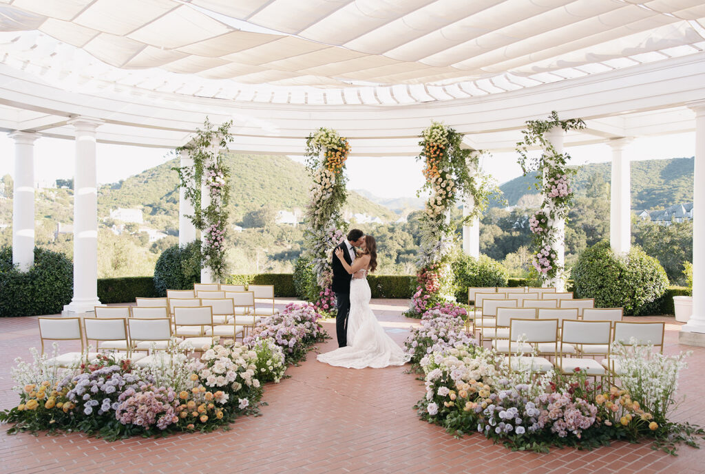 Bride and groom photos on East Terrace at Sherwood Country Club