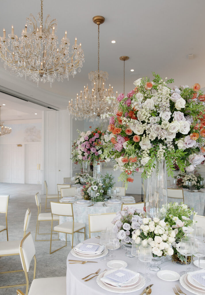 Floral-forward luxury wedding reception design at Sherwood Country Club