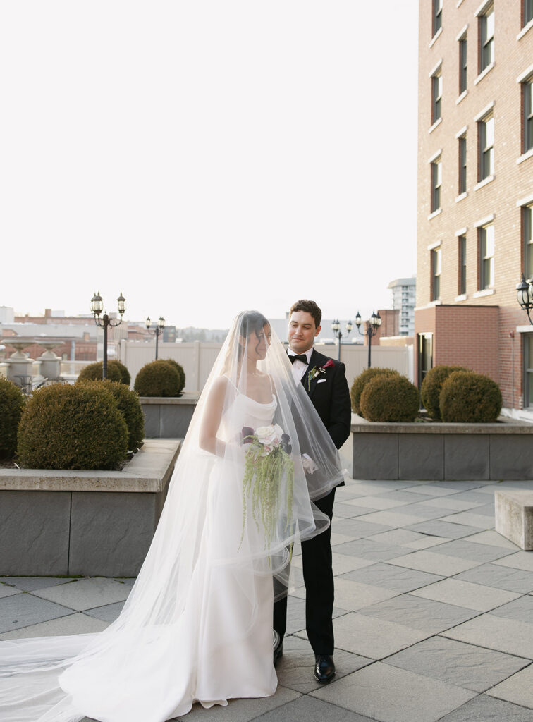 Bride and groom portraits on the rooftop of the Historic Davenport Hotel in Spokane